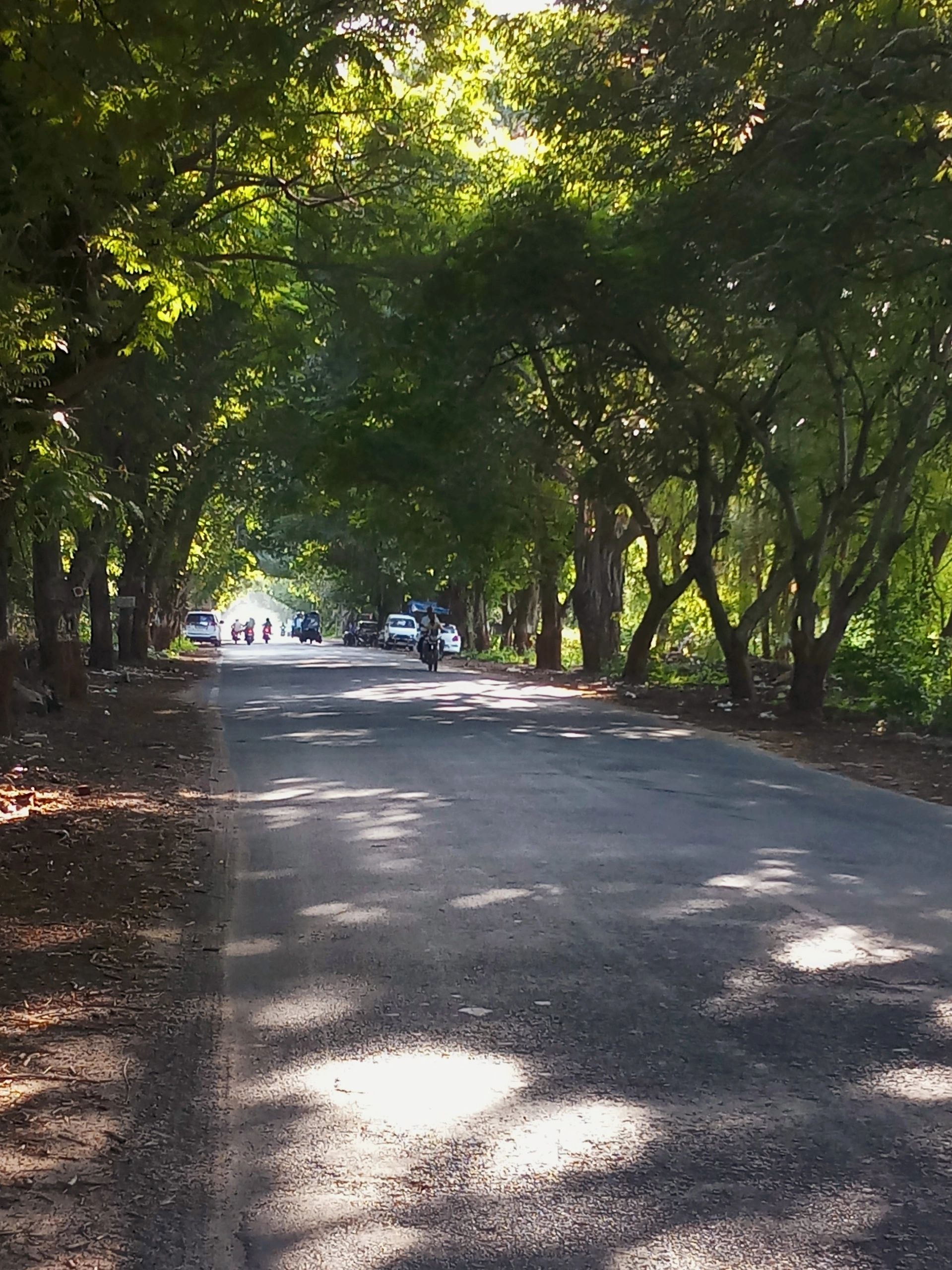 Car on an open road in India, representing outstation travel